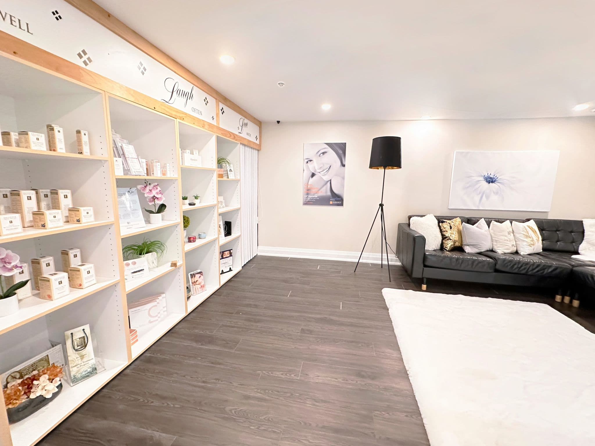 Eminence Organic Skincare retail wall at Leslie Med Spa Newmarket — full Hungarian skincare line on display